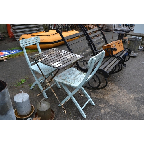 129 - Two antique wood slat conservatory chairs and Table