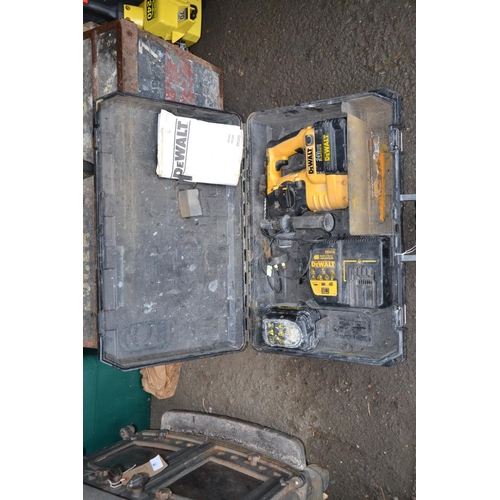 86 - Dewalt 240v combi drill with two batteries & charger. Condition of batteries unknown