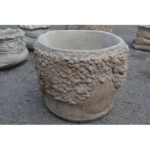 206 - Pair of Concrete Circular planters decorated with flower relief