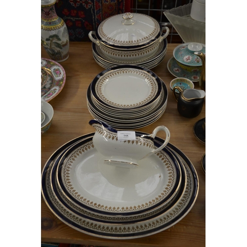 400 - Burslem part dinner service in navy and gilt