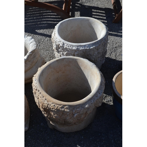 206 - Pair of Concrete Circular planters decorated with flower relief