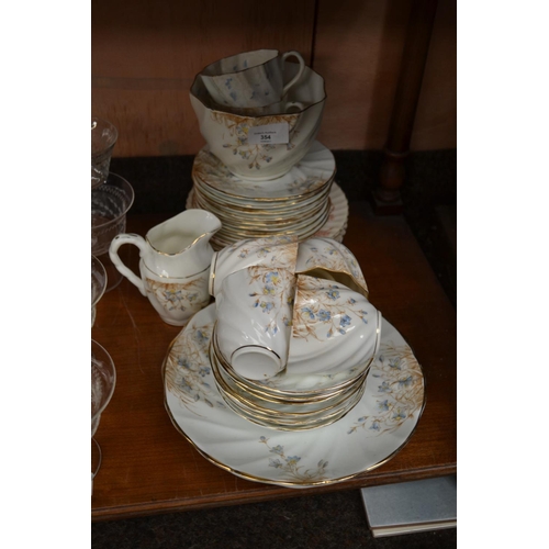 354 - Victorian tea service, 9 plates, 6 cups, 8 saucers , 2 large plates 7 slop basin