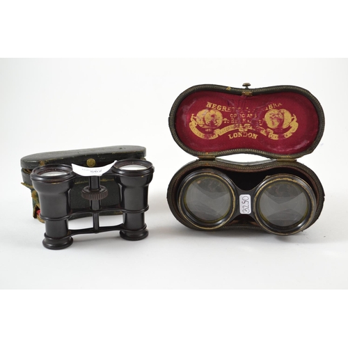 562 - 2 pairs of cased opera glasses, 1 marked London, 1 marked Italy.