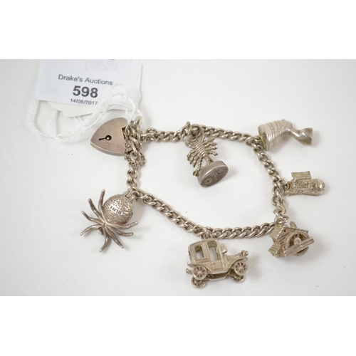 598 - Silver charm bracelet