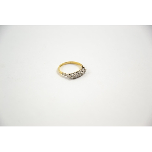 664 - 18ct gold ring set with five diamonds