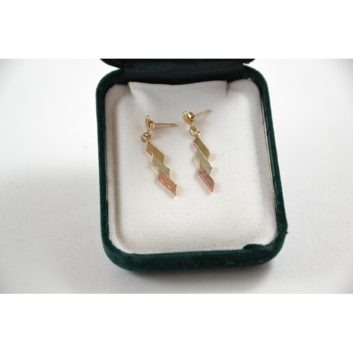 667 - 9ct lighting bolt earrings, tri-colour