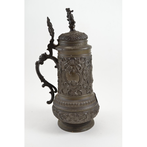 688 - Large metal German Stein, embellished with lovers & cherubs