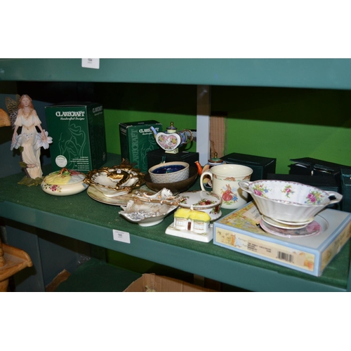 185 - All ceramics on shelf inc. Fairy collectables, small teapots etc.