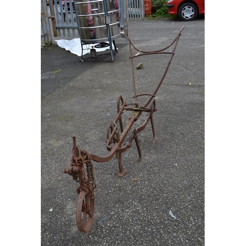 106 - Antique metal horse drawn plough, garden feature