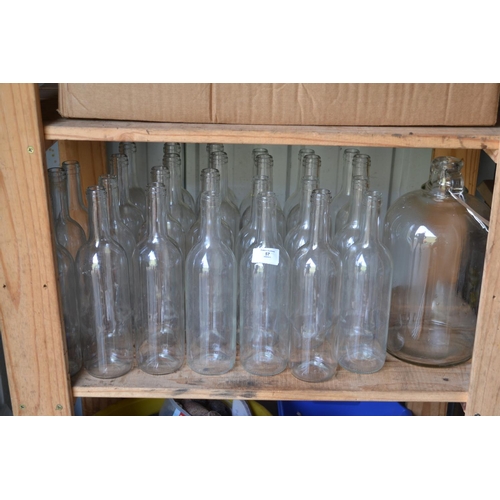 57 - Various empty bottles & demijohns