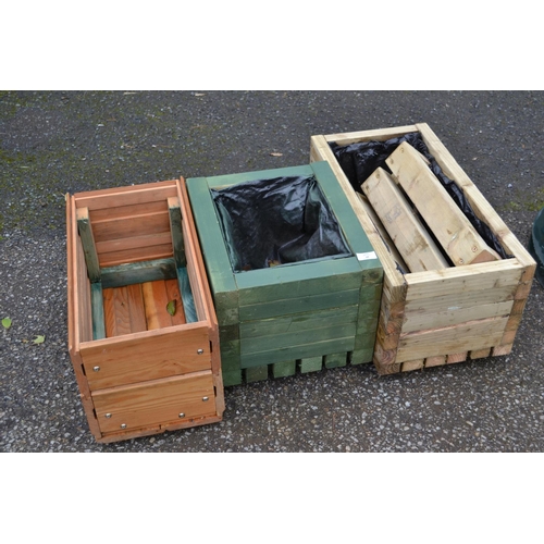 98 - 3 wooden raised planters