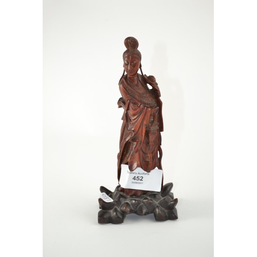 452 - Small oriental finely carved hardwood figure