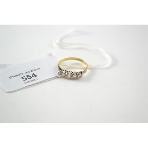 554 - 18ct gold ring set with five diamonds