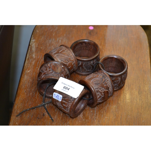 604 - Carved hardwood napkin rings