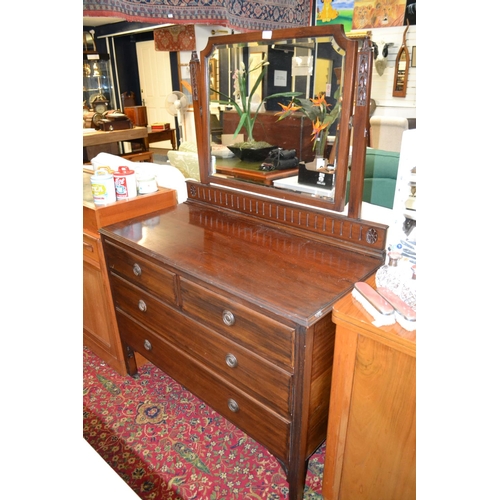 692 - Two over two mahogany mirror backed chest of drawers.