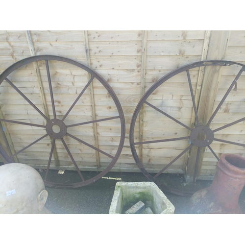 7 - Pair of antique wrought iron wagon wheels (1 AF). Dia 123cm.