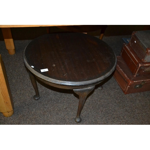 39 - Darkwood circular table on cabriole legs