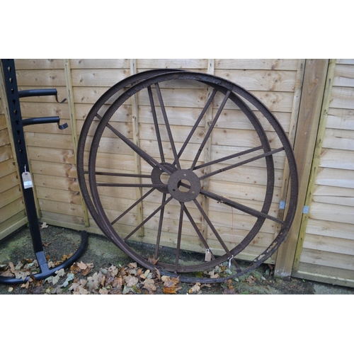 7 - Pair of antique wrought iron wagon wheels (1 AF). Dia 123cm.