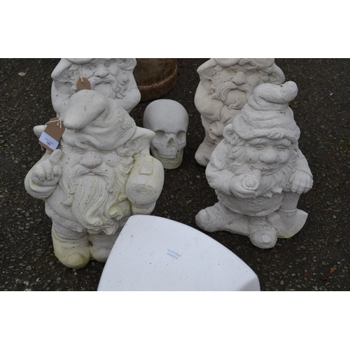 151 - Pair of concrete garden gnomes