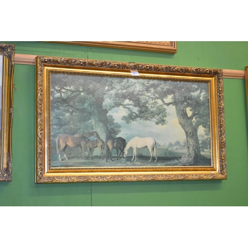 179 - Textured print in an ornate frame of grazing horses, 81cm X 42cm