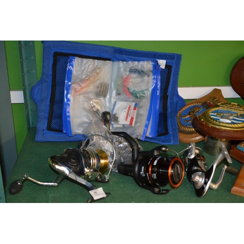 194 - 3 reels inc. Mitchell & Afina Pro + 2 Okuma + Case of lures, weights etc.