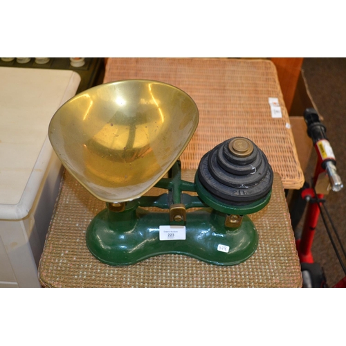 223 - Green painted & brass kitchen scales and weights