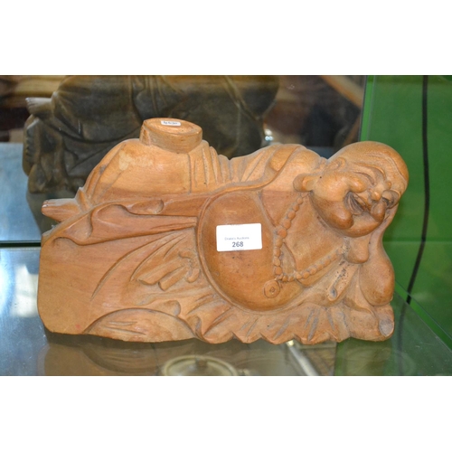 268 - Reclining carved laughing Buddha