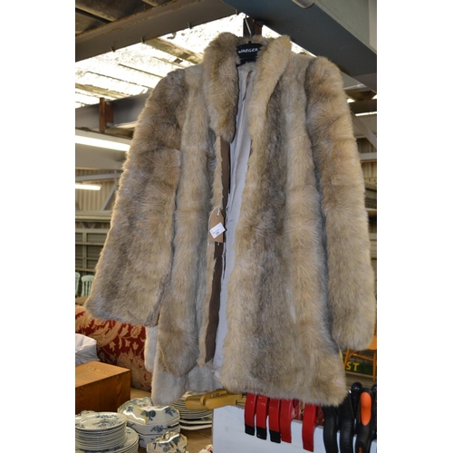 339 - 2 ladies faux fur coats