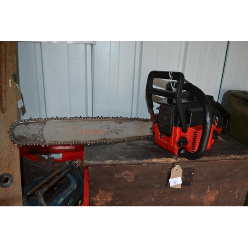 83 - Petrol chainsaw. Tested in good running order