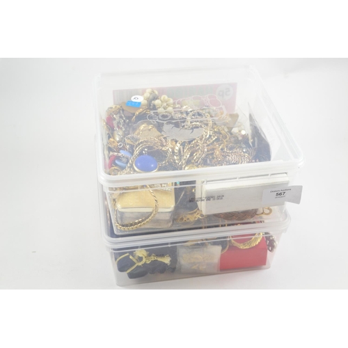 567 - Two tubs of dress jewellery