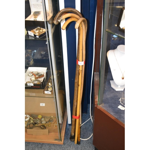 623 - Bundle of Cane Walking Sticks one with Silver Cap