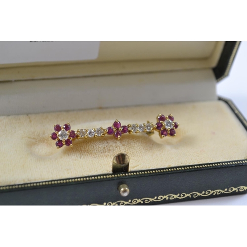 636 - 18ct gold diamond & ruby set bespoke brooch (HBJ). Set with 8 diamonds & 12 rubies