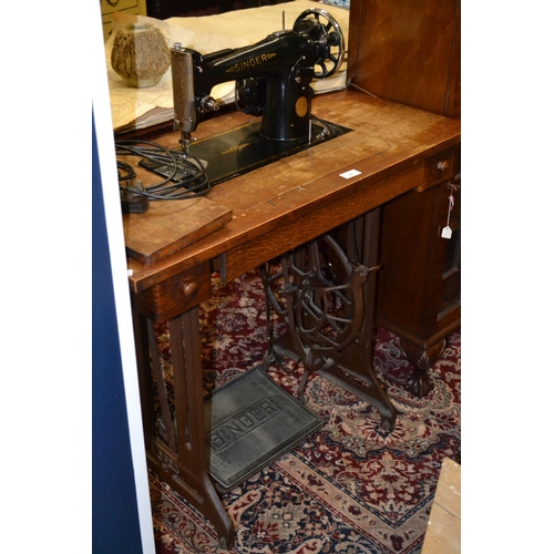 764 - Electric Singer Sewing Machine on Treadle Base