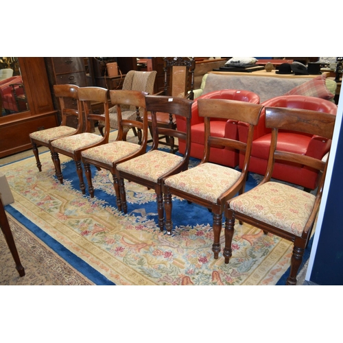 813 - Six early C20 mahogany dining chairs with upholstered seats