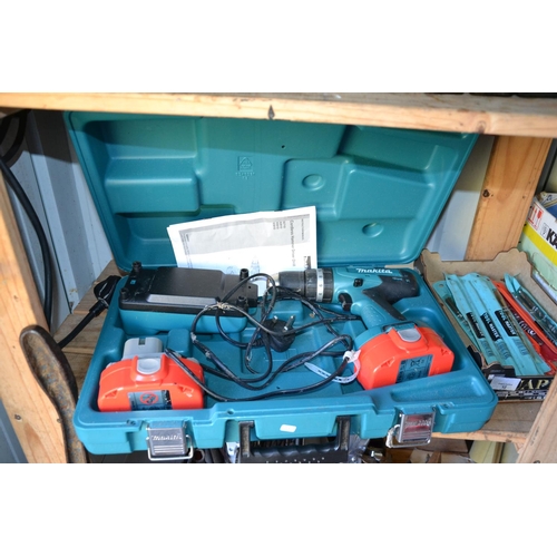 11 - Makita combi-drill with 2 batteries & charger in box