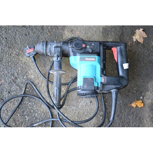 13 - Makita 230v breaker/hammer drill combi. SDS plus size.