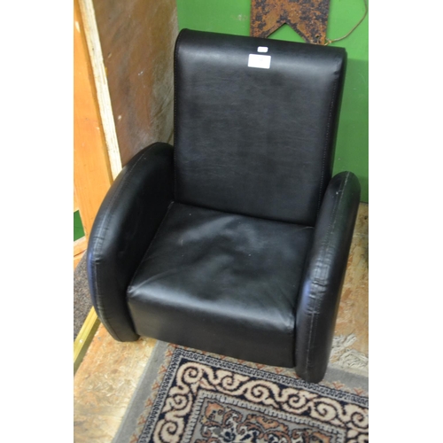 122 - Child's leatherette fold down armchair