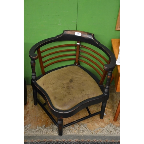 123 - Low ebonised corner chair with swept arms & leather seat