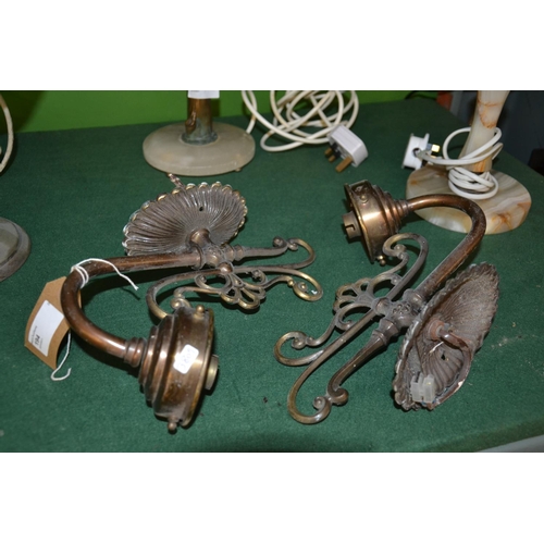 194 - Pair of brass wall lights