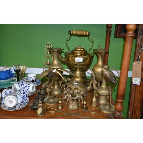 228 - Qty of brassware on shelf