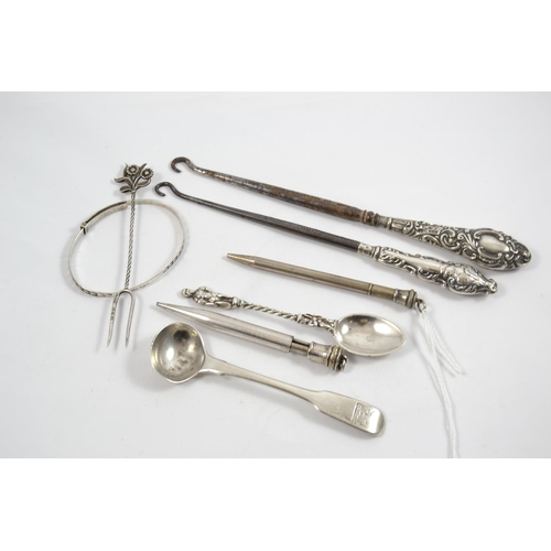 104 - Collection of silver items, silver handled button hooks, spoons etc.