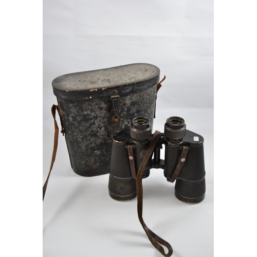 122 - WWII German Carl Zeiss binoculars in case. D.f 7x50. N16626. With Swastika emblem.