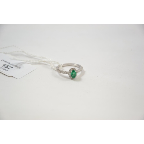157 - 18ct emerald & diamond cluster ring, size M