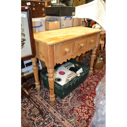 294 - Three drawer stripped pine side table, w 90cm x d 38cm x h76cm