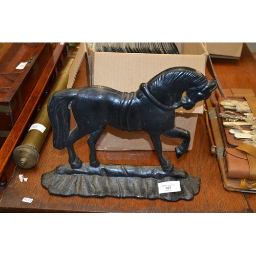 307 - Cast iron horse door stop