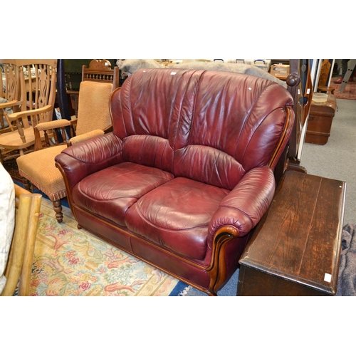 336 - Burgandy 2 seater Italian leather sofa