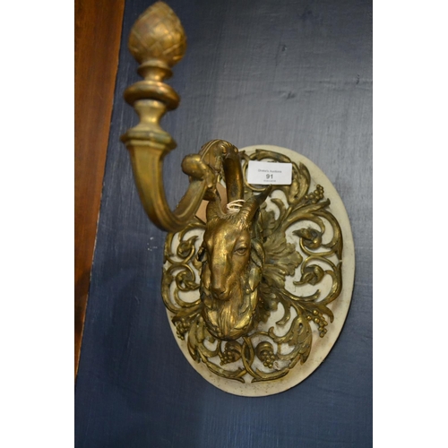 91 - Contemporary decorated wall bracket, with goats head & finial