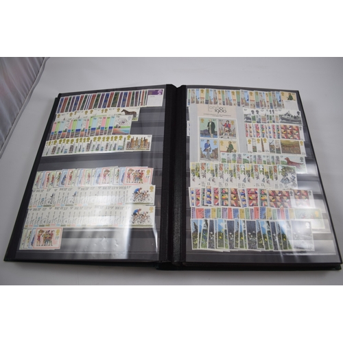 396 - GB QE2 mint commemoratives in 1 stock book