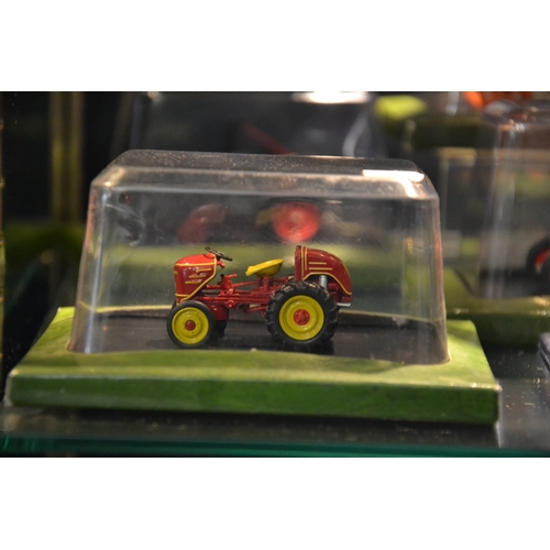 174 - 7 boxed tractors