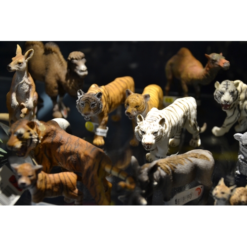 173 - Lrg qty Schleich animal figurines on top shelf